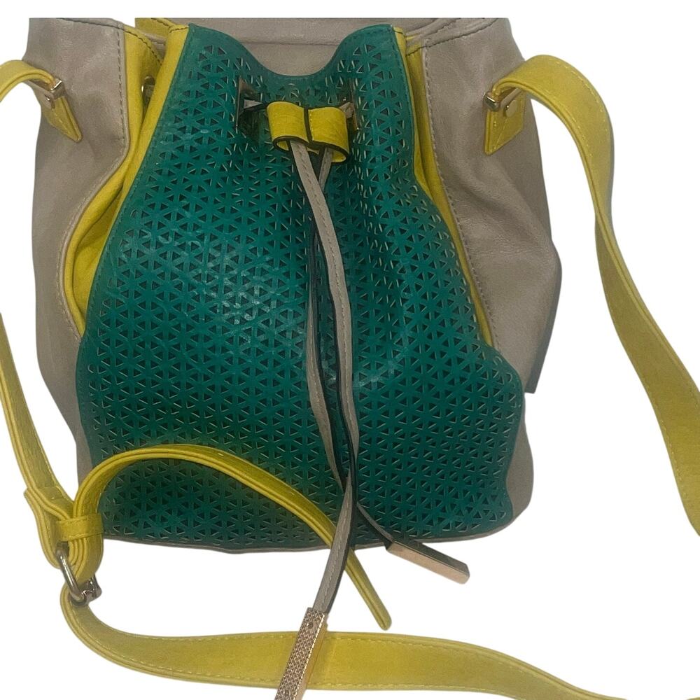 Melie Bianco Perforated Green Yellow Tan Bucket Drawstring Faux Leather Bag